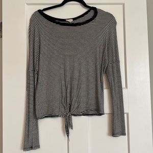 Horizontal Black and white long sleeve top. Tie at bottom.
